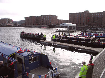 The flotilla of boats arrives at Salthouse Dock.